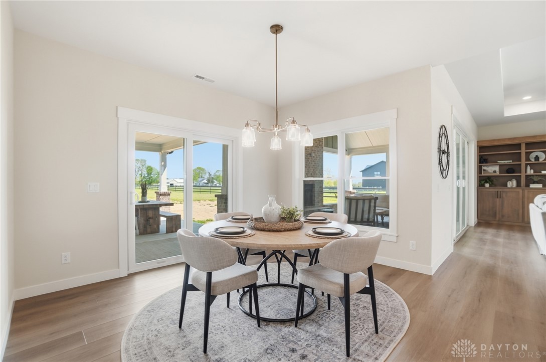 9364 Kenrick Road Dayton, OH 45458 - Photo 61 of 62 This bright dining area offers an open floor plan, ideal for memorable gatherings and daily meals.