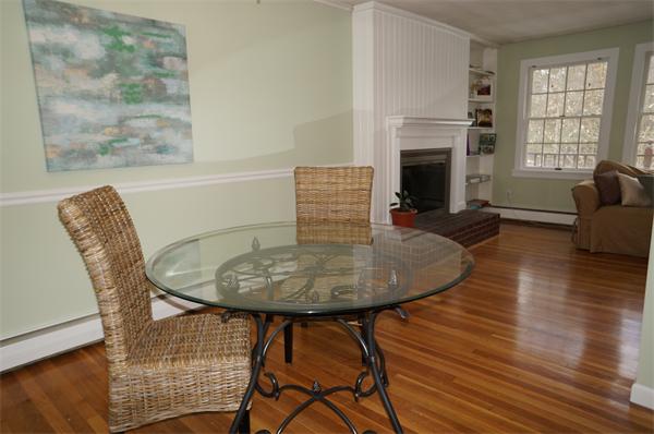 245 Harvard Road Stow, MA 01775 - Photo 4 of 12 a view of a dining room with furniture and wooden floor