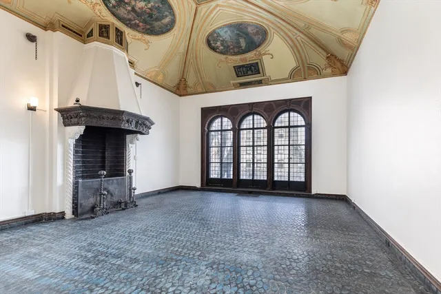 a view of an entryway with a fireplace