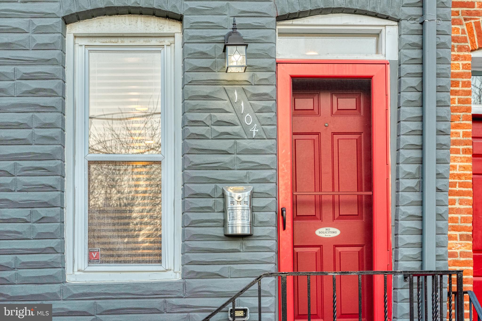 1104 Riverside Avenue Baltimore, MD 21230 - Photo 3 of 26 a view of front door of a house with a red door