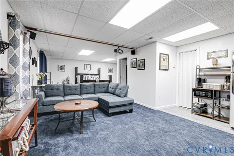 a living room with furniture and a couch