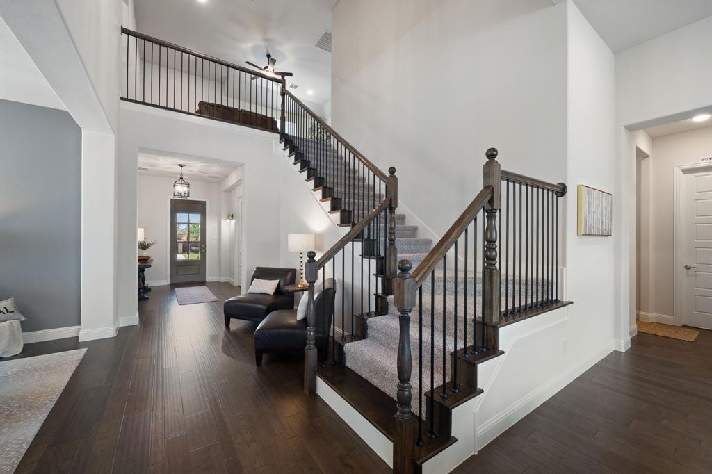 11705 Little Elm Creek Road Flower Mound, TX 76226 - Photo 22 of 39 a view of entryway and hall with wooden floor