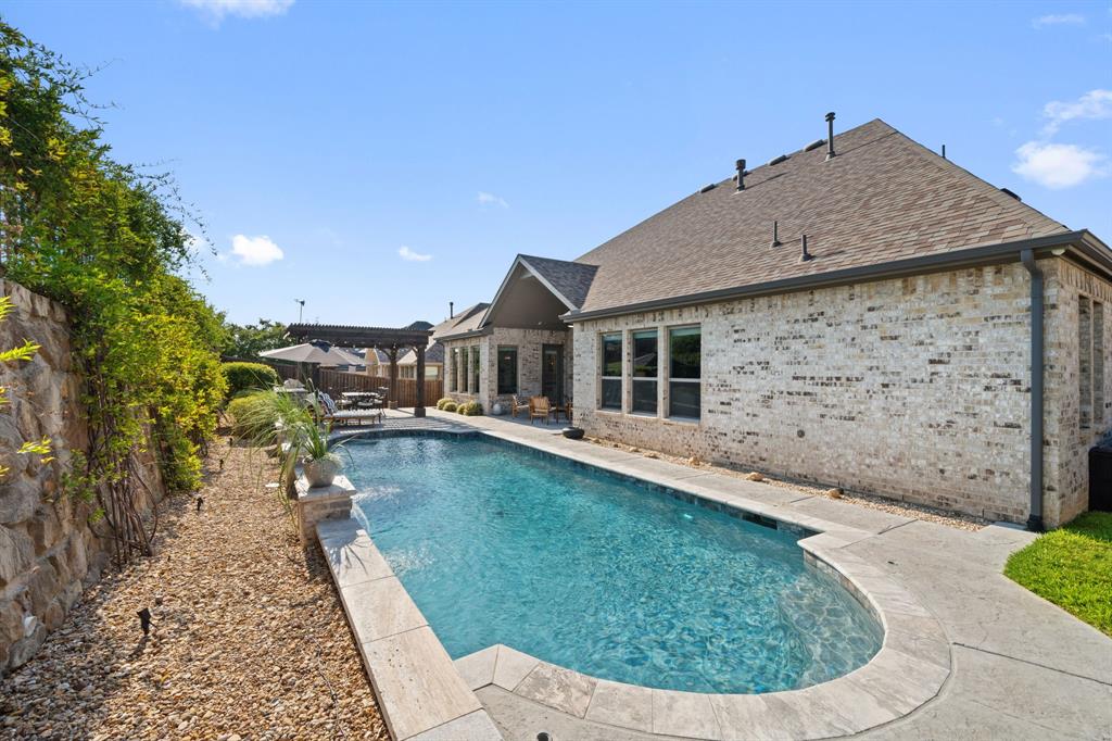 11705 Little Elm Creek Road Flower Mound, TX 76226 - Photo 34 of 39 a view of a house with roof deck