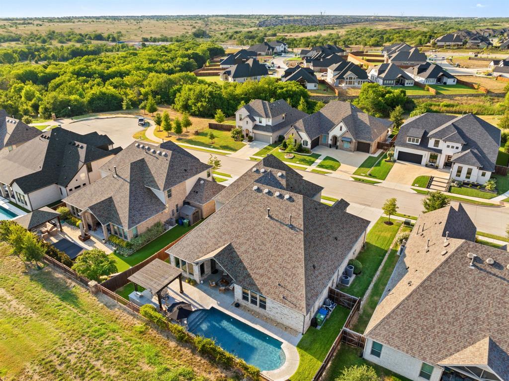 11705 Little Elm Creek Road Flower Mound, TX 76226 - Photo 37 of 39 an aerial view of residential houses with outdoor space