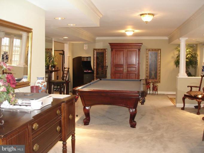 4801 Broom Drive Olney, MD 20832 - Photo 12 of 19 a room with a table chairs and mirrors