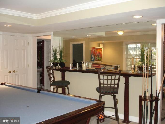 4801 Broom Drive Olney, MD 20832 - Photo 13 of 19 a view of a room with gym equipment