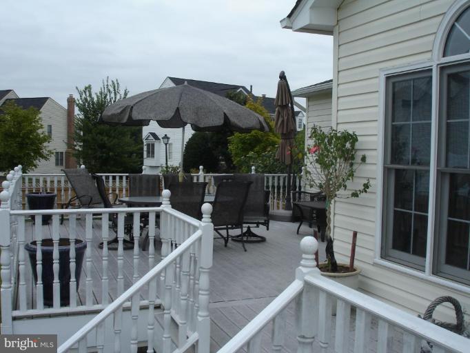 4801 Broom Drive Olney, MD 20832 - Photo 17 of 19 a view of balcony with furniture and a potted plant