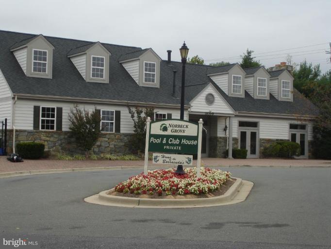 4801 Broom Drive Olney, MD 20832 - Photo 18 of 19 a front view of a house with a yard