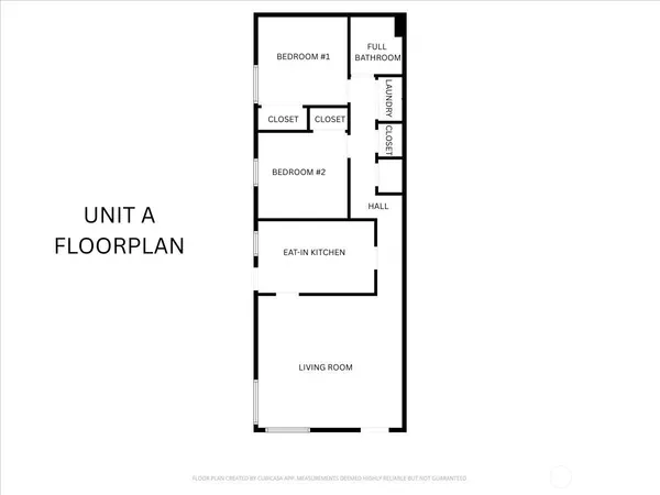 a picture of a bench in front of a wall