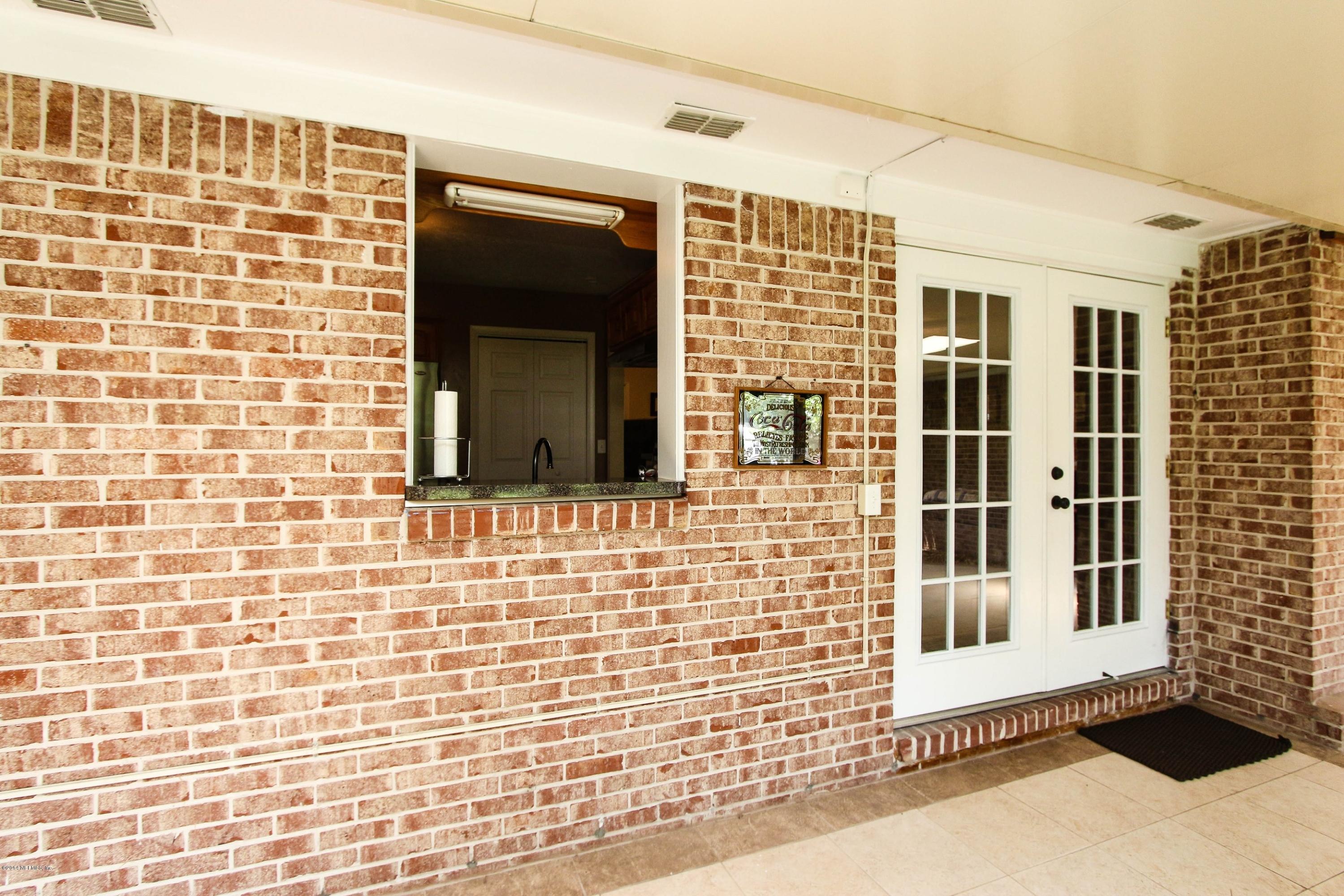 1109 Alderman Road East Jacksonville, FL 32211 - Photo 24 of 26 Pass Thru from Kitchen to Sun Room