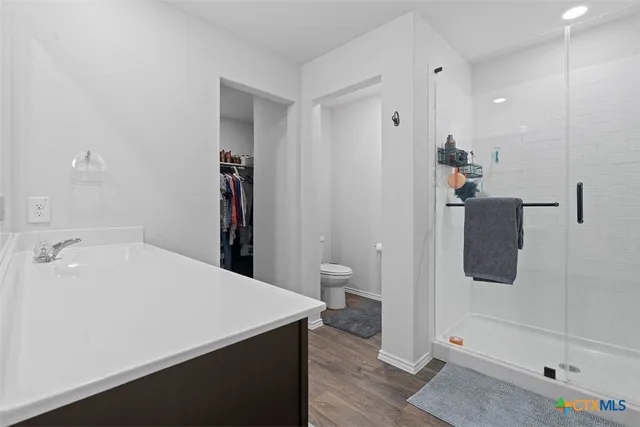 a bathroom with a sink and mirror