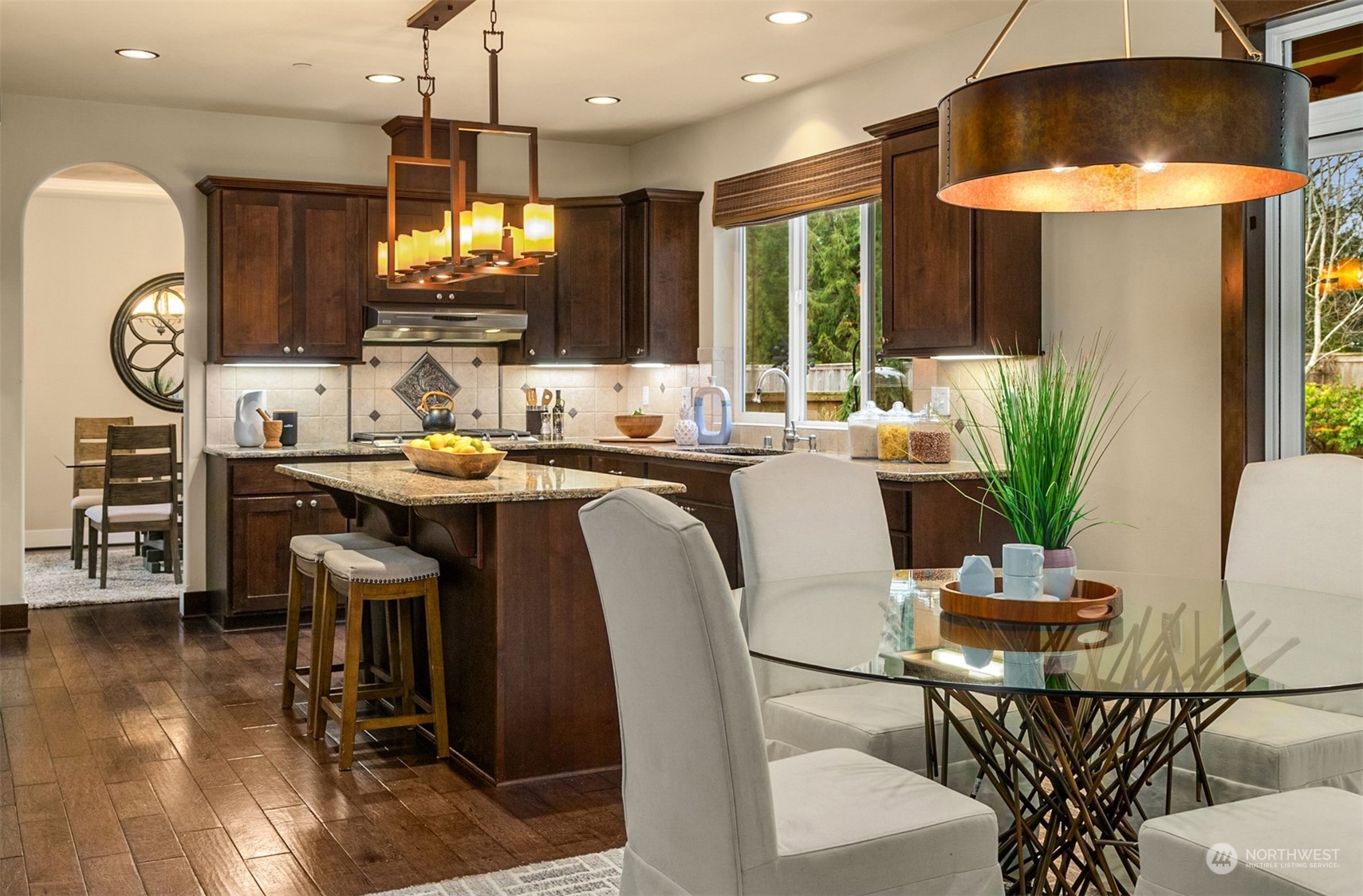 21710 31st Drive Southeast Bothell, WA 98021 - Photo 14 of 35 a view of a dining room with furniture and wooden floor