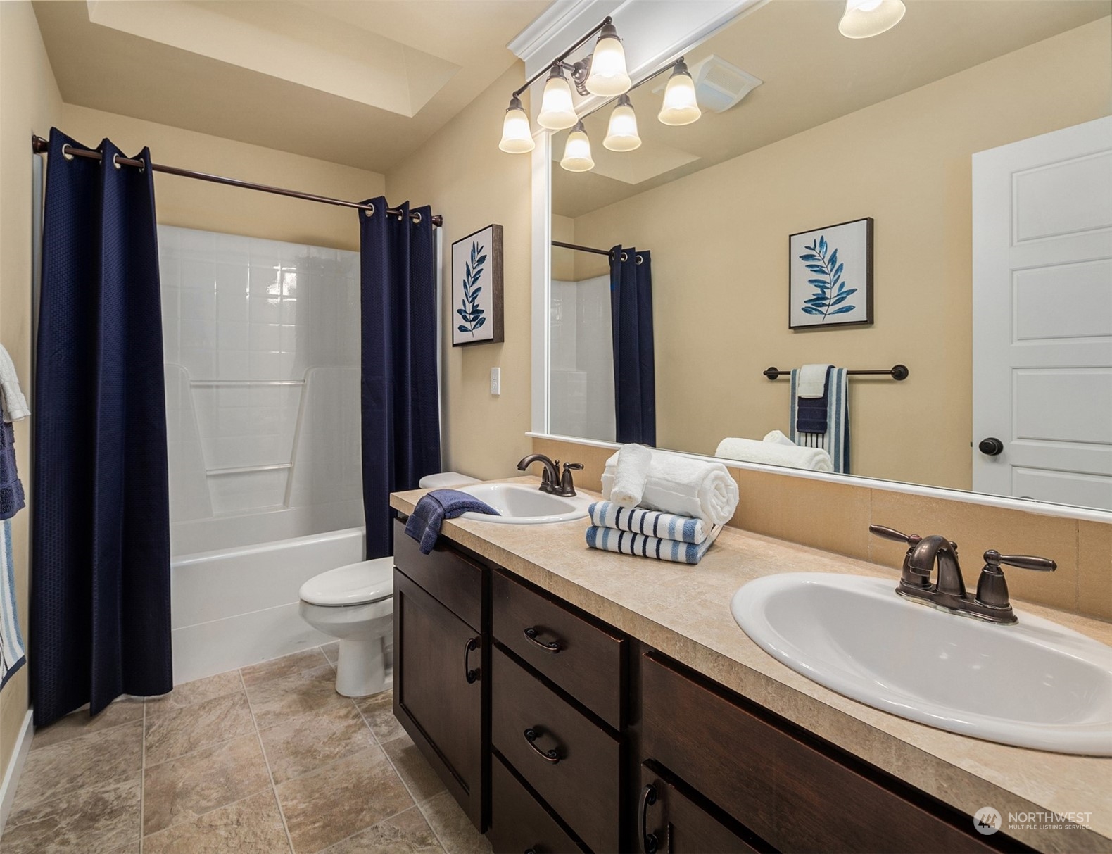 21710 31st Drive Southeast Bothell, WA 98021 - Photo 29 of 35 a bathroom with a sink double vanity granite tub and shower