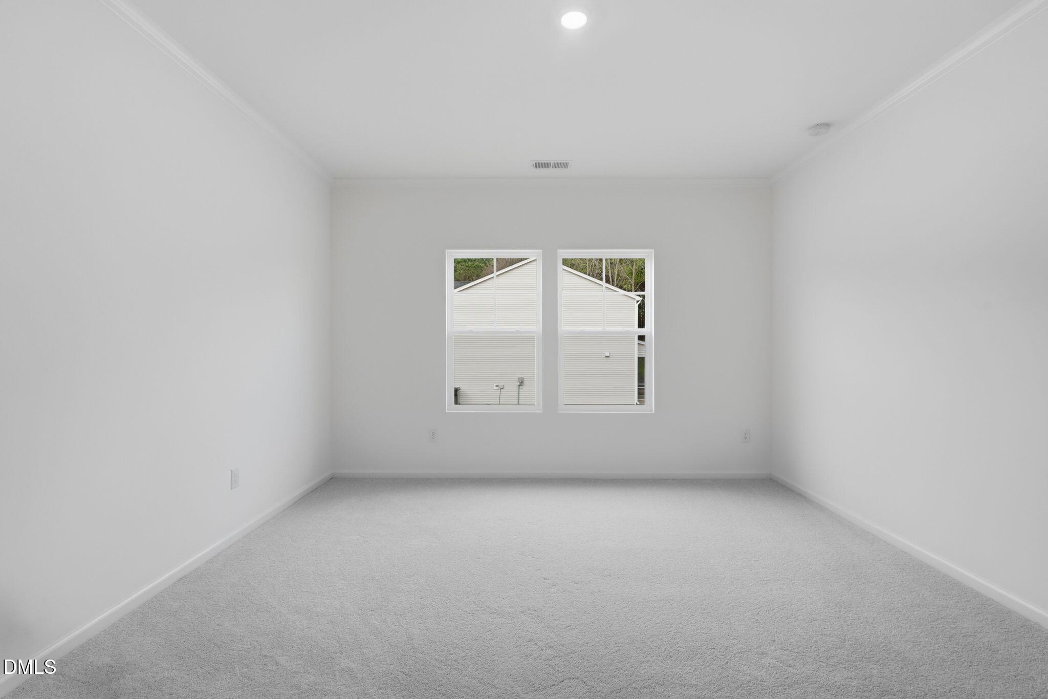 155 Digging Time Avenue Princeton, NC 27569 - Photo 17 of 29 an empty room with a window