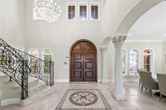 a view of a livingroom with furniture window and wooden floor