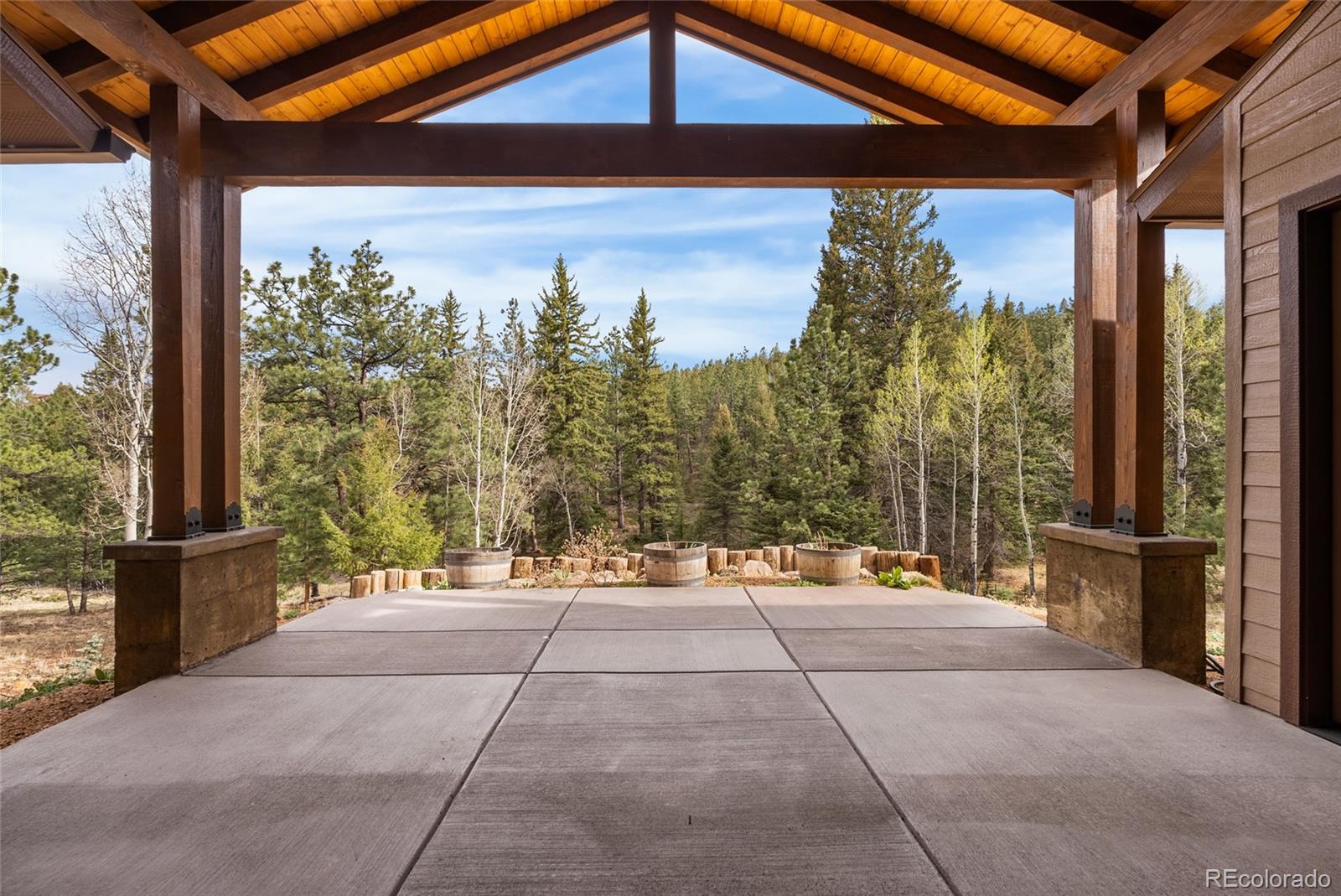 280 Double Tree Road Bailey, CO 80421 - Photo 2 of 43 a view of a porch