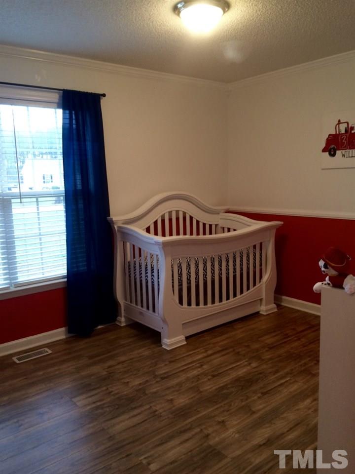 258 Wagner Road Willow Spring, NC 27592 - Photo 15 of 22 a view of livingroom with furniture and window