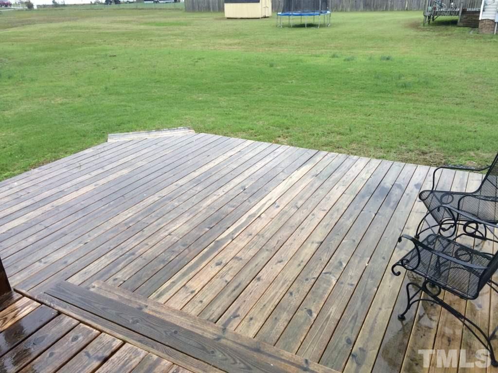 258 Wagner Road Willow Spring, NC 27592 - Photo 20 of 22 a view of a house with a yard