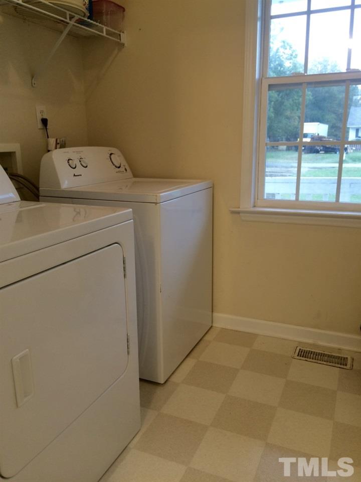 258 Wagner Road Willow Spring, NC 27592 - Photo 10 of 22 a utility room with dryer and washer