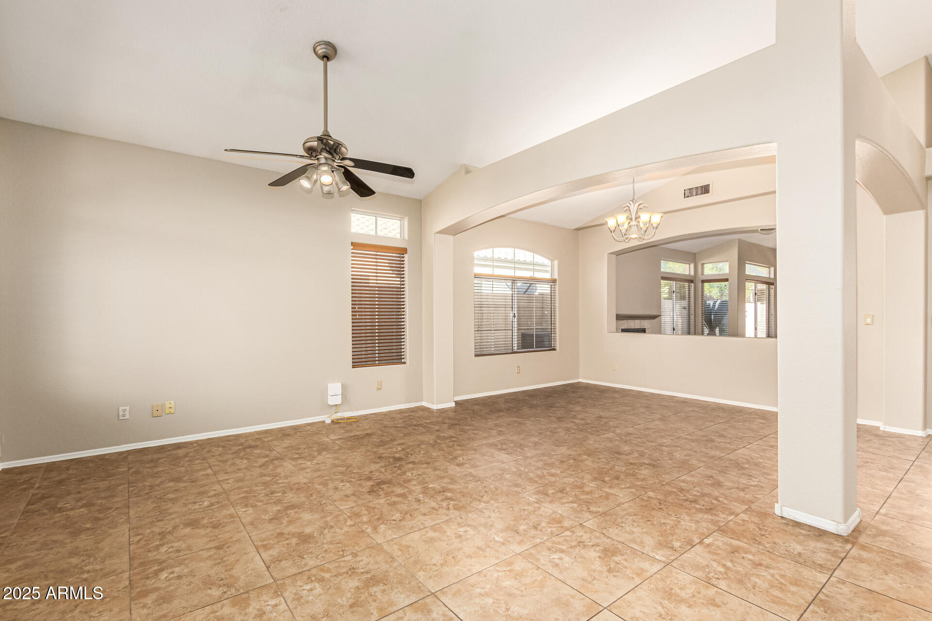 16617 South 14th Street Phoenix, AZ 85048 - Photo 2 of 26 a view of an empty room with a window