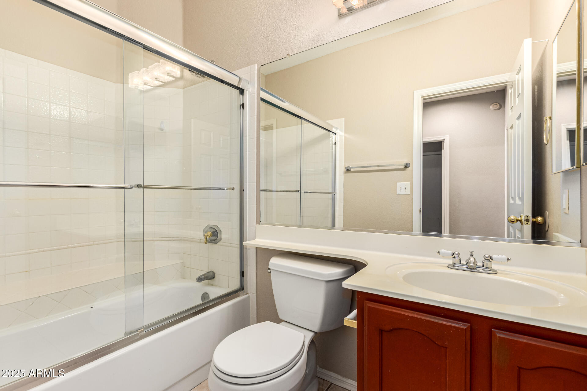 16617 South 14th Street Phoenix, AZ 85048 - Photo 21 of 26 a bathroom with a sink a toilet and shower