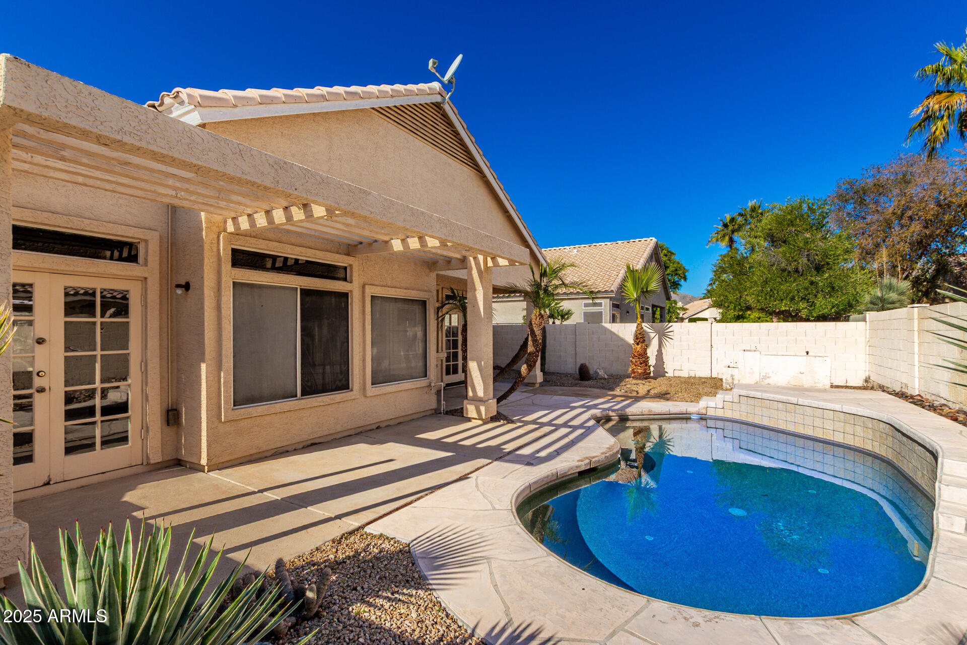 16617 South 14th Street Phoenix, AZ 85048 - Photo 25 of 26 a view of a house with pool