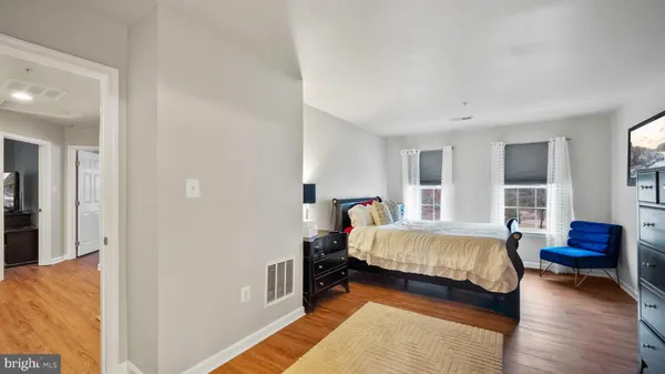 a bed room with a bed and a couch