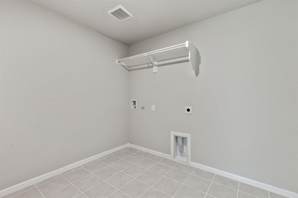7620 Kingfisher Road Aubrey, TX 76227 - Photo 25 of 32 a view of an empty room