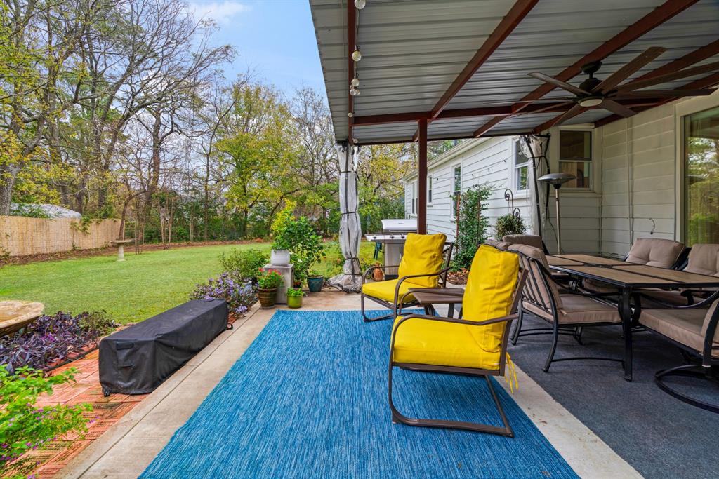 2257 Cleveland Street Paris, TX 75460 - Photo 19 of 28 a view of a swimming pool with lounge chairs in patio