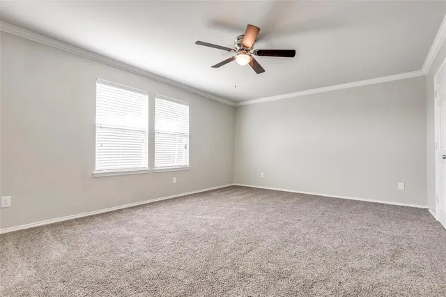 a view of a house with backyard and a garden