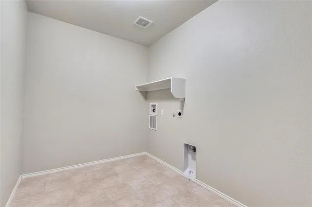 a view of a lake with a house and a big yard