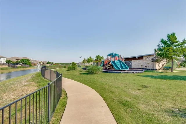 a street sign on the side of building