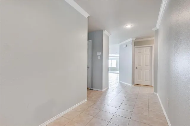 a kitchen with stainless steel appliances granite countertop refrigerator a sink dishwasher a oven with wooden cabinets and floor