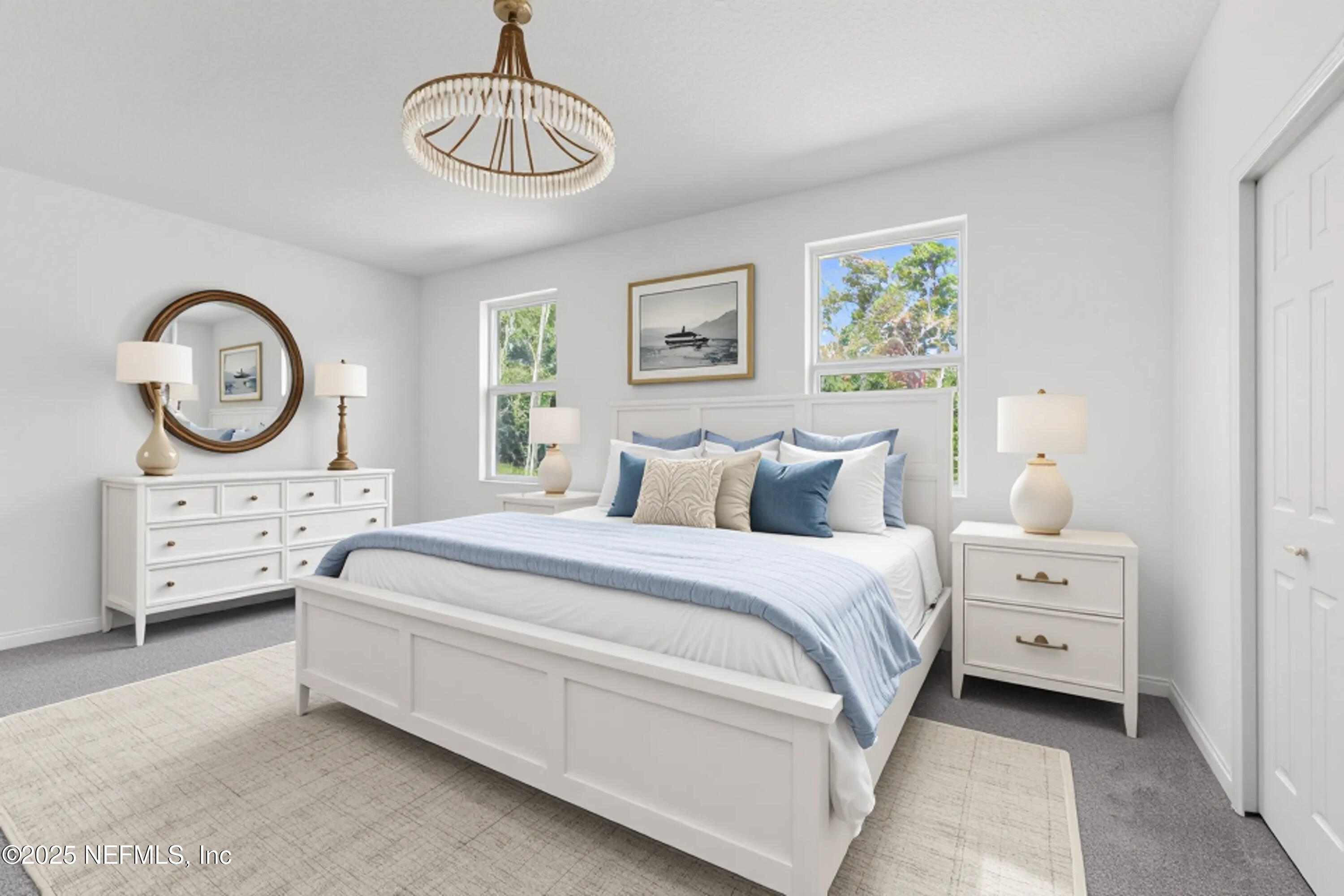 12476 Gate Road Jacksonville, FL 32226 - Photo 11 of 29 a bed room with bed and a chandelier