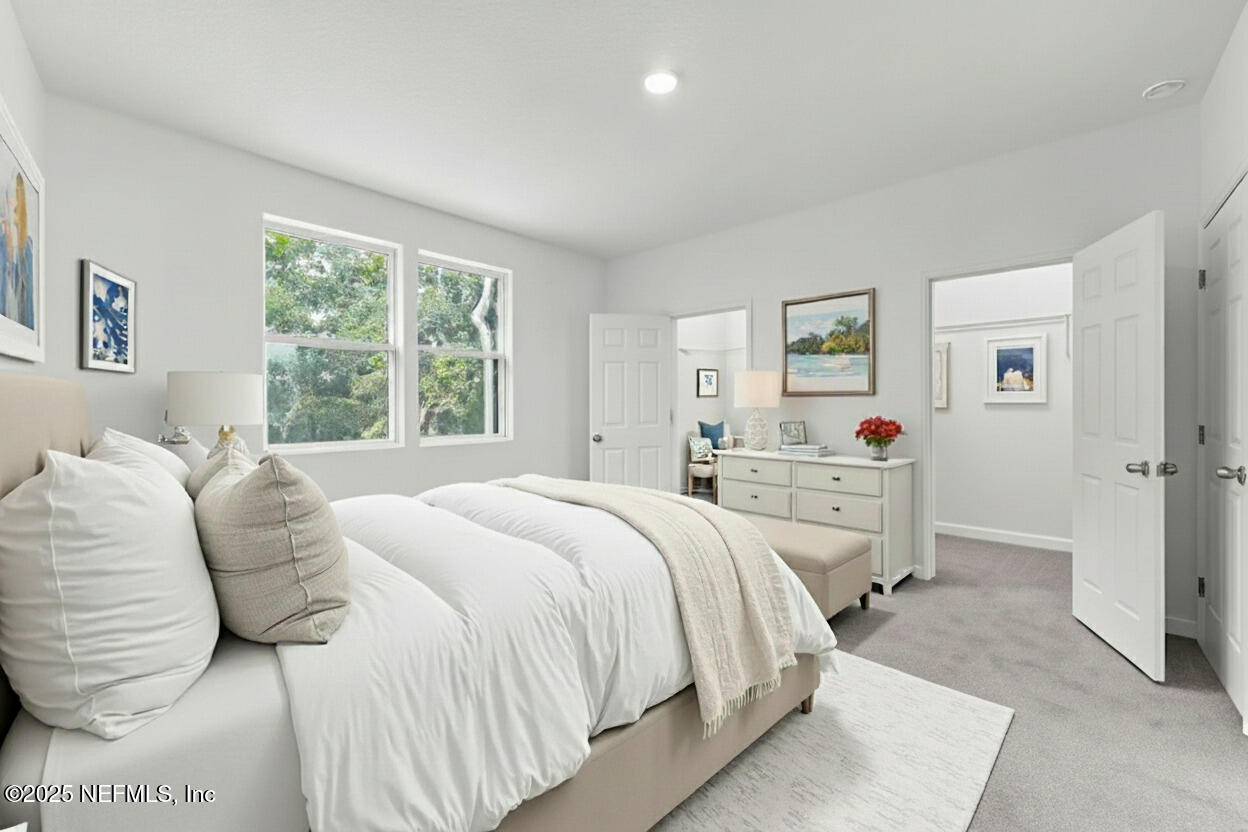 12476 Gate Road Jacksonville, FL 32226 - Photo 12 of 29 a bedroom with two beds and a window