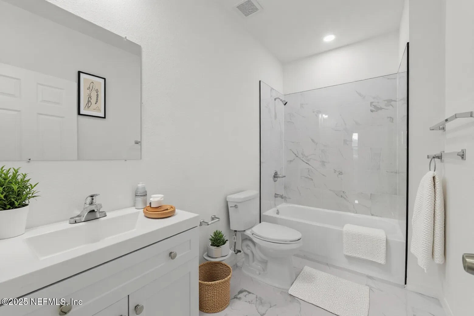 12476 Gate Road Jacksonville, FL 32226 - Photo 5 of 29 a bathroom with a sink toilet and shower