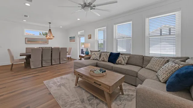 a kitchen with kitchen island a counter top space a sink appliances and cabinets
