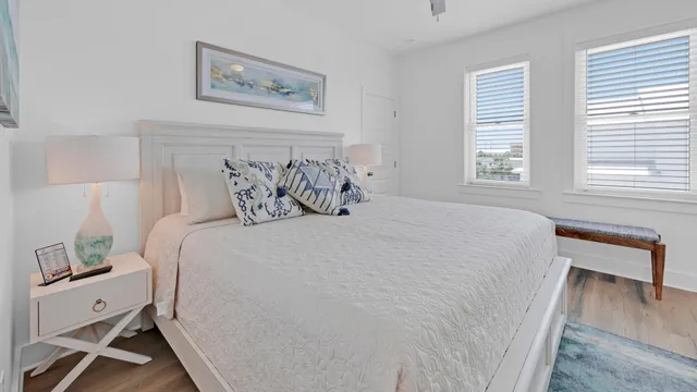 a view of room with furniture and wooden floor