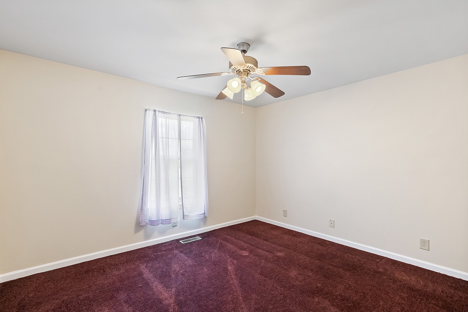 6159 H B Lee Road Springfield, TN 37172 - Photo 11 of 28 an empty room with a window and a fan