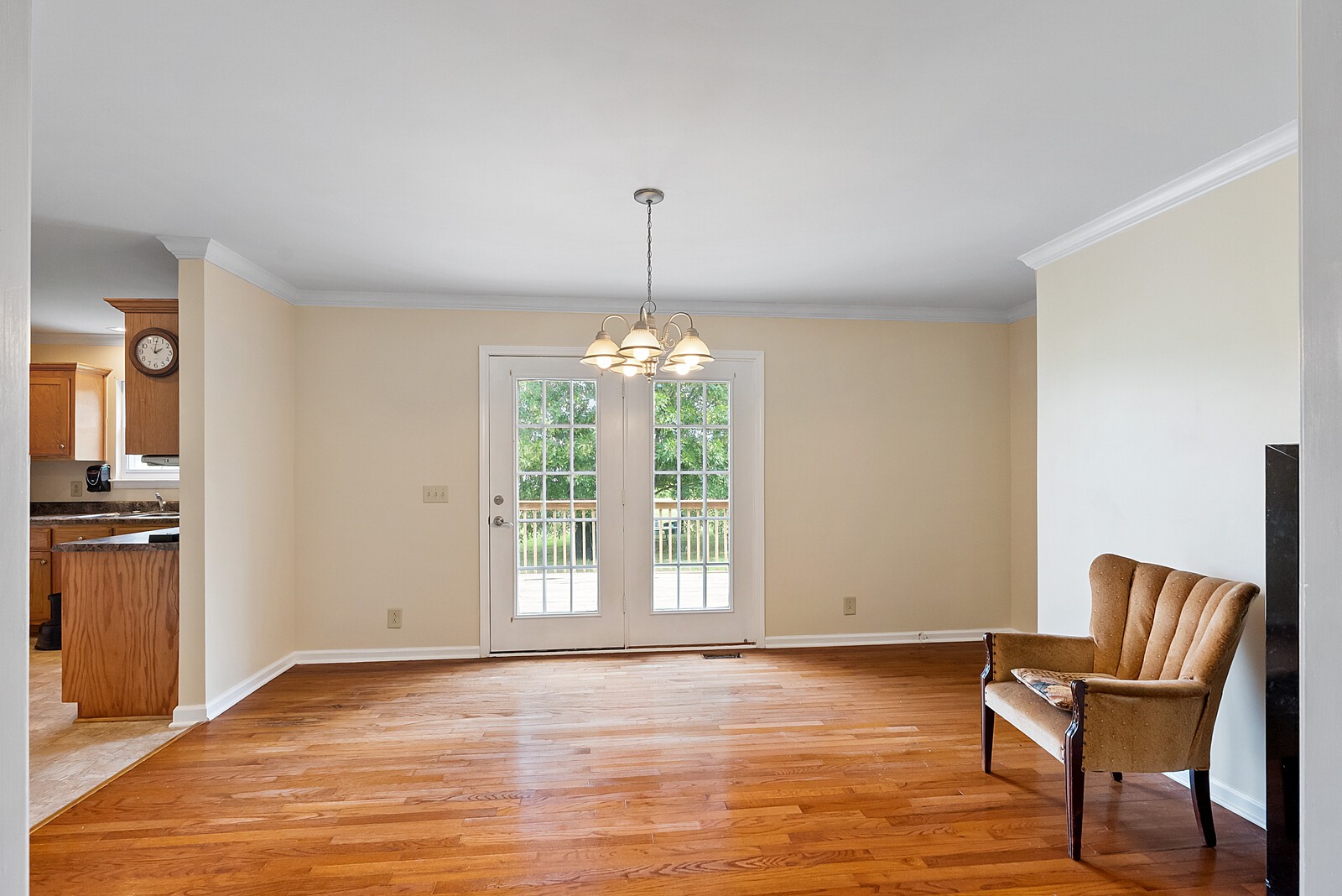 6159 H B Lee Road Springfield, TN 37172 - Photo 13 of 28 a view of an empty room with window and wooden floor