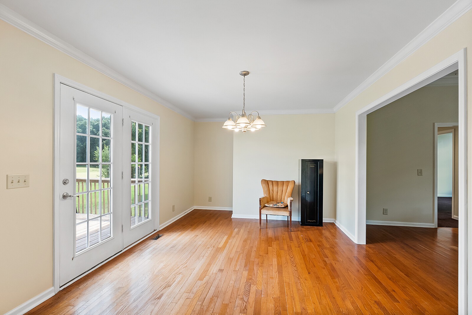 6159 H B Lee Road Springfield, TN 37172 - Photo 15 of 28 a view of empty room with wooden floor and fan