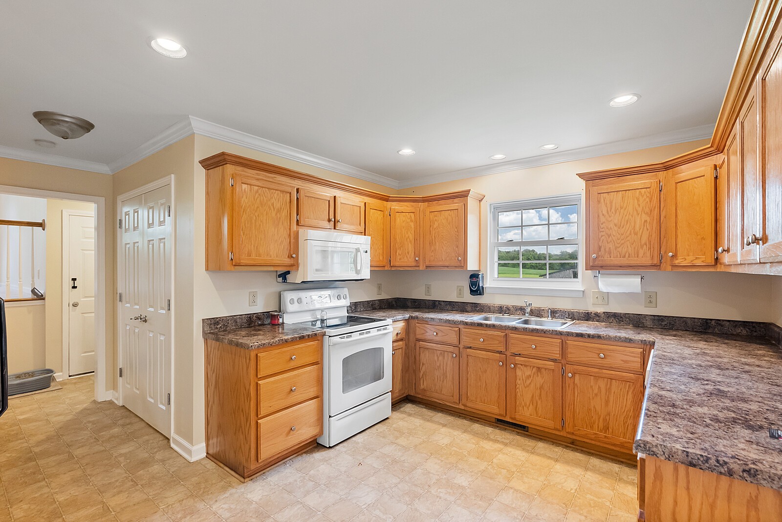 6159 H B Lee Road Springfield, TN 37172 - Photo 16 of 28 a kitchen with a sink stove and cabinets