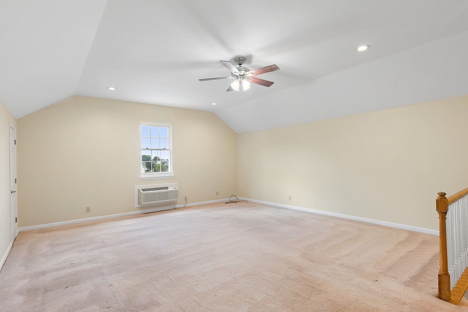 6159 H B Lee Road Springfield, TN 37172 - Photo 19 of 28 an empty room with a chandelier fan and windows