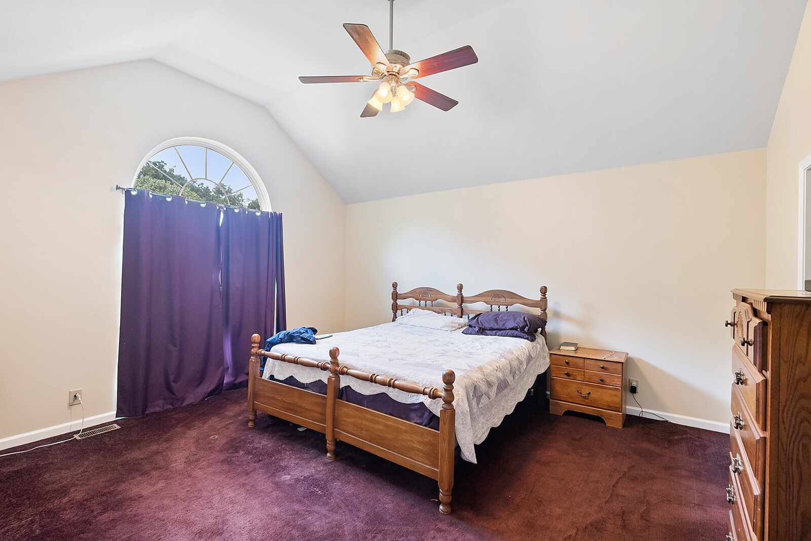 6159 H B Lee Road Springfield, TN 37172 - Photo 6 of 28 a bedroom with a bed and a chandelier