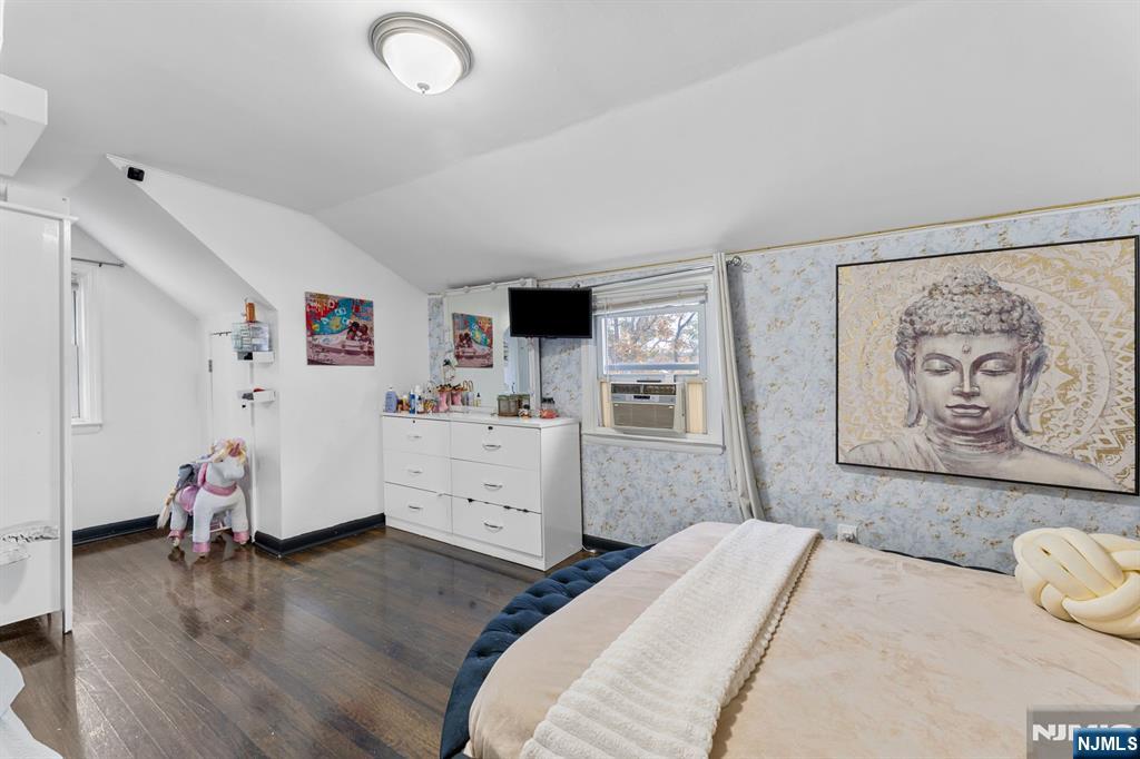 111 East 10th Street Linden, NJ 07036 - Photo 24 of 39 a bedroom with a bed and a window