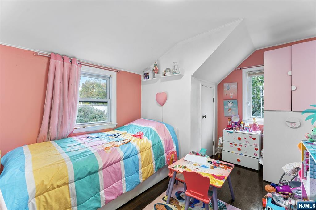 111 East 10th Street Linden, NJ 07036 - Photo 26 of 39 a bedroom with a bed dresser and a window