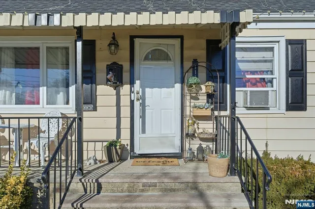 a front view of a house with a porch