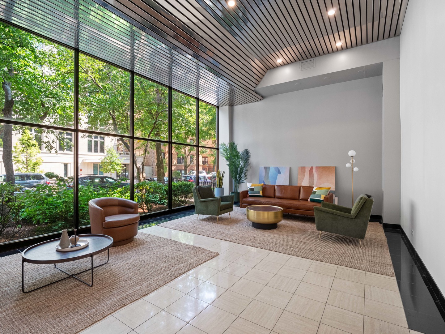 2754 North Hampden Court, Unit 708 Chicago, IL 60614 - Photo 18 of 27 a living room with furniture and floor to ceiling windows
