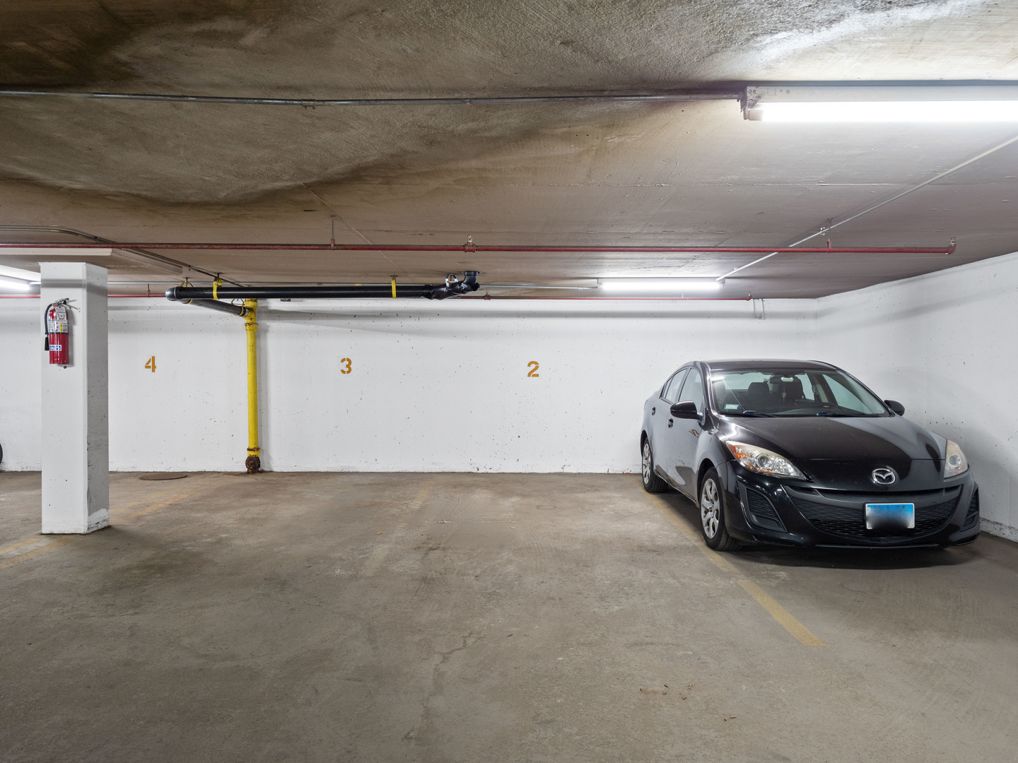 2754 North Hampden Court, Unit 708 Chicago, IL 60614 - Photo 27 of 27 a car parked in a garage