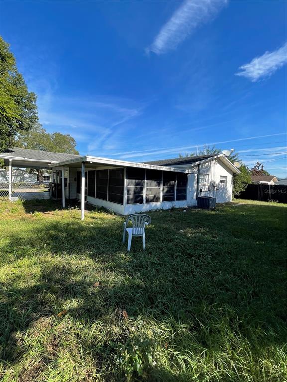 6442 Inca Street Orlando, FL 32807 - Photo 28 of 30 Backyard view of screened porch